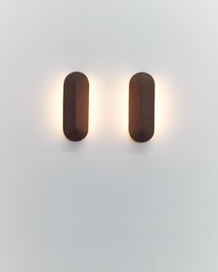 New Volumes Terracotta Pinch Marrone small wall light by Kate Stokes