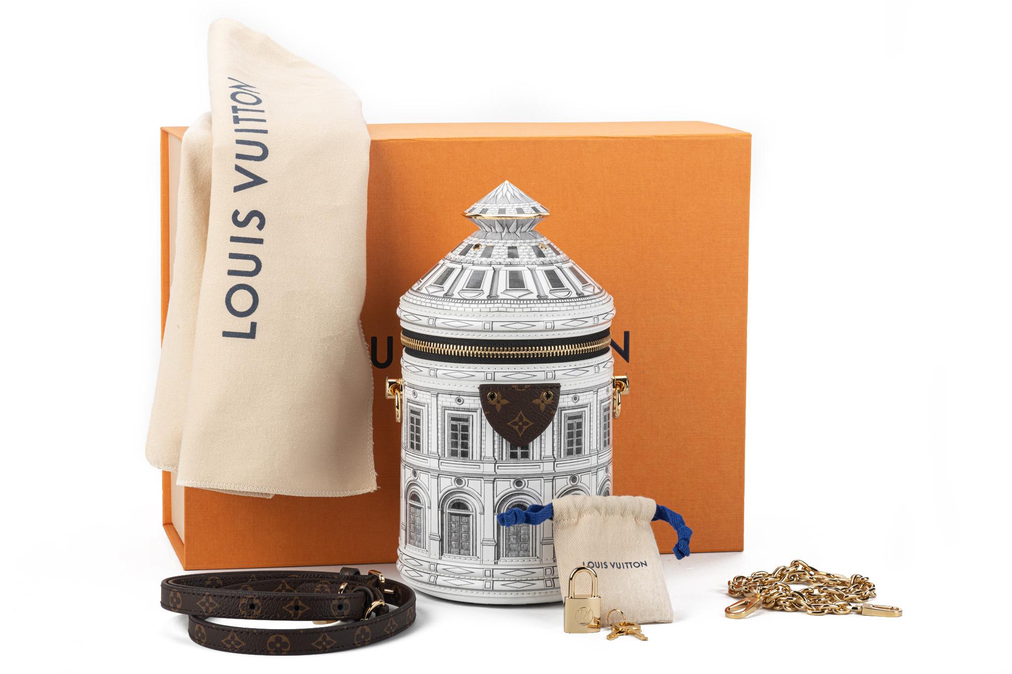 Louis Vuitton limited edition Fornasetti collection, battistero bag. Printed patent leather with twi interchangeable straps , one in gold metal and one in monogram coated canvas. Brand new in box with original dust cover. Sold out worldwide .