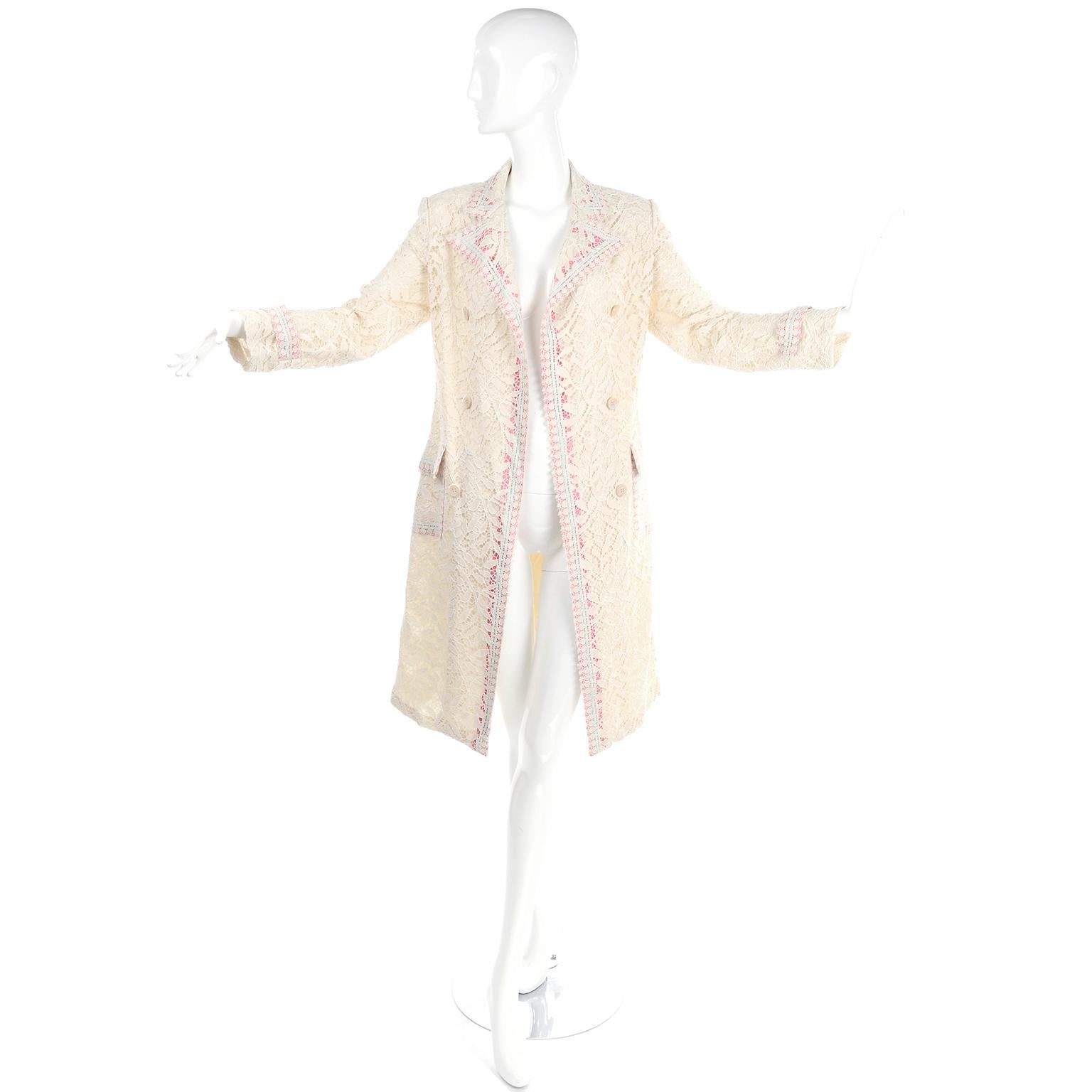 This is a lovely, rare, 1970's deadstock vintage lace coat from Bill Blass The coat still has its Saks Fifth Avenue tag and the extra buttons in their envelope attached and was never worn! This beautiful cream lace coat has no closures and lovely