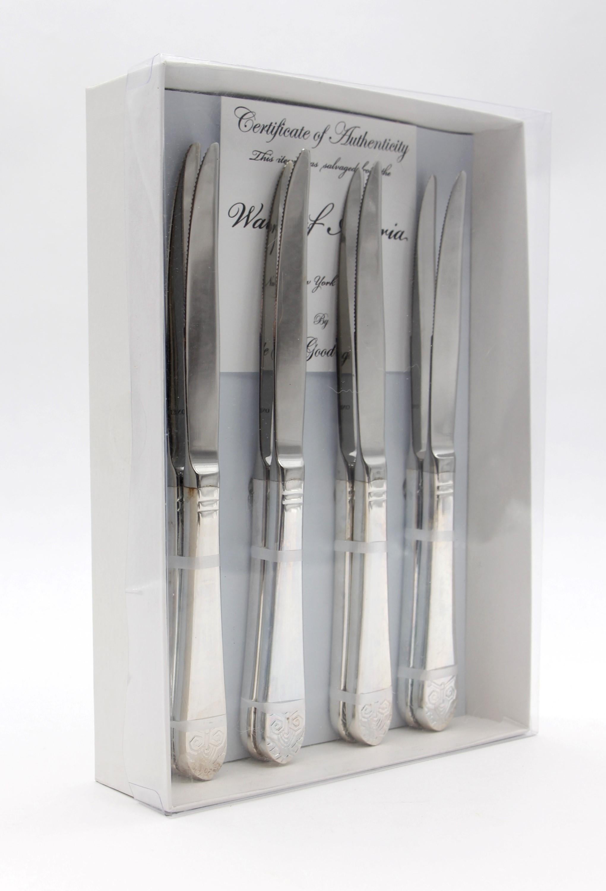 2010s Silver plated steel unused new old stock steak knife set. Made by Oneida. These pieces were backstock in the Waldorf Astoria Hotel on Park Ave in New York City and were to be used as replacements but never were. All pieces are stamped Waldorf