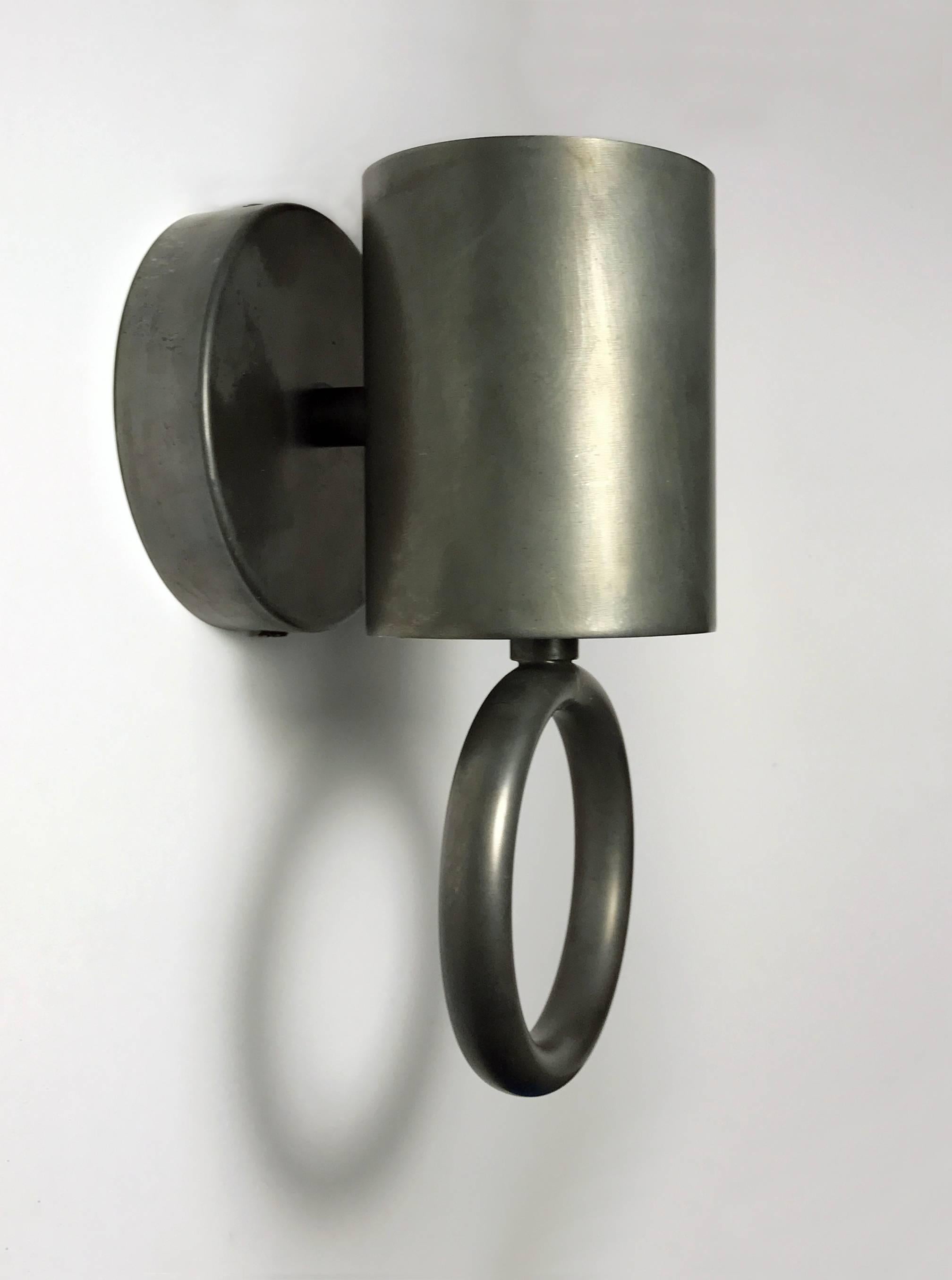 A compact wall light that works as uplighter or downlight. 
Shown here in a Rustic bronze finish. 
Created especially for Led GU10 bulbs.
    