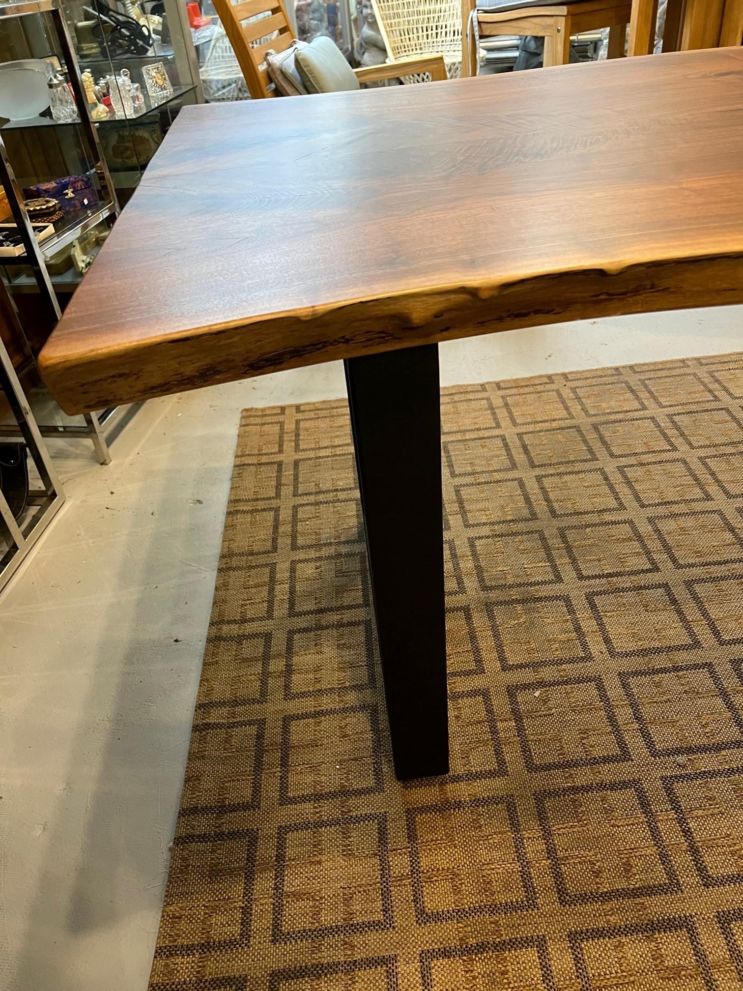 Contemporary  Walnut Live Edge Dining Table with Black Metal Base For Sale