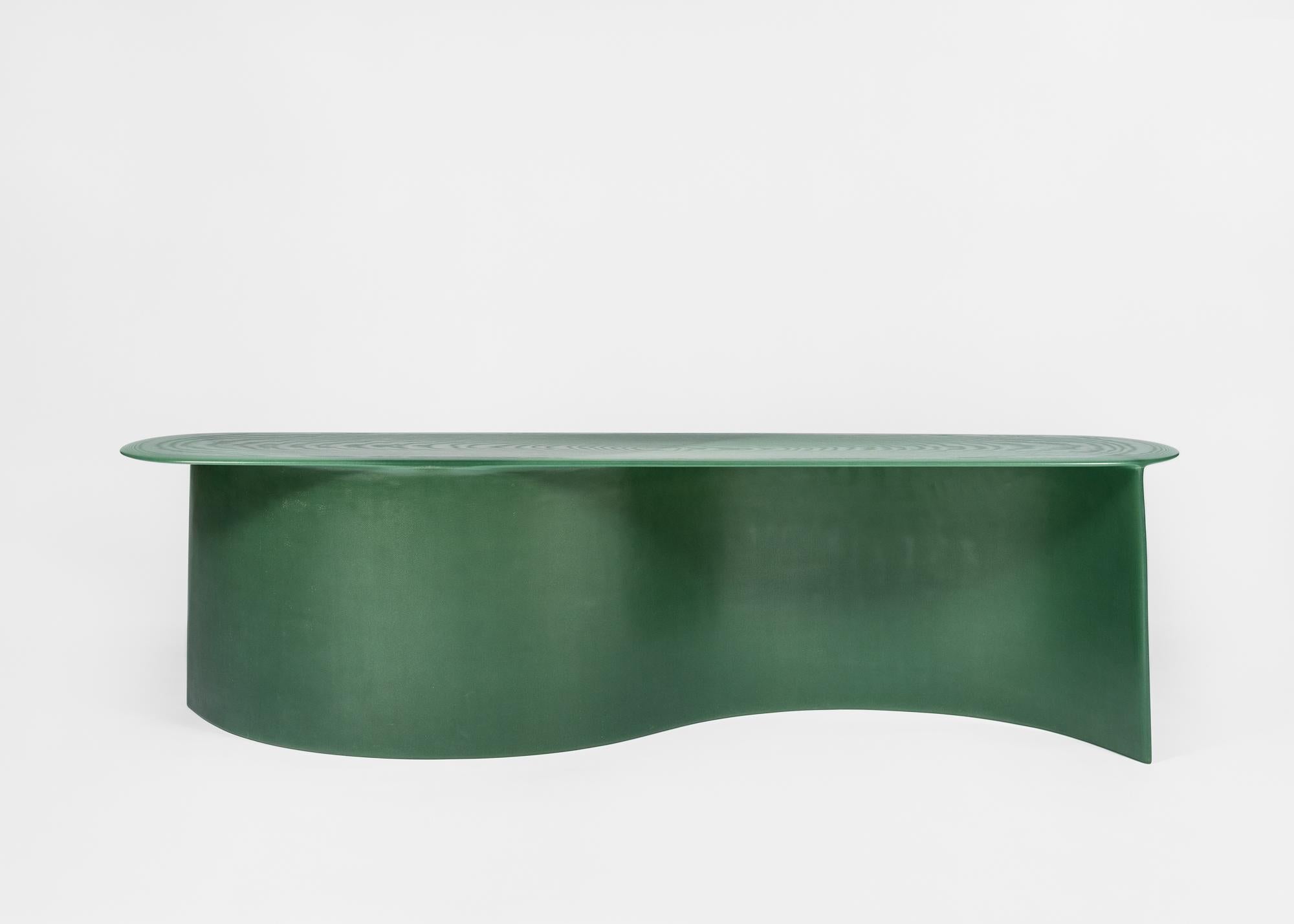 The New Wave Bench by STUDIO LUKAS COBER. The New Wave collection illustrates his fascination for oceans force. They are built by hand-layering numerous layers of fiberglass cloth with resin into desired shapes. After combining the shapes and