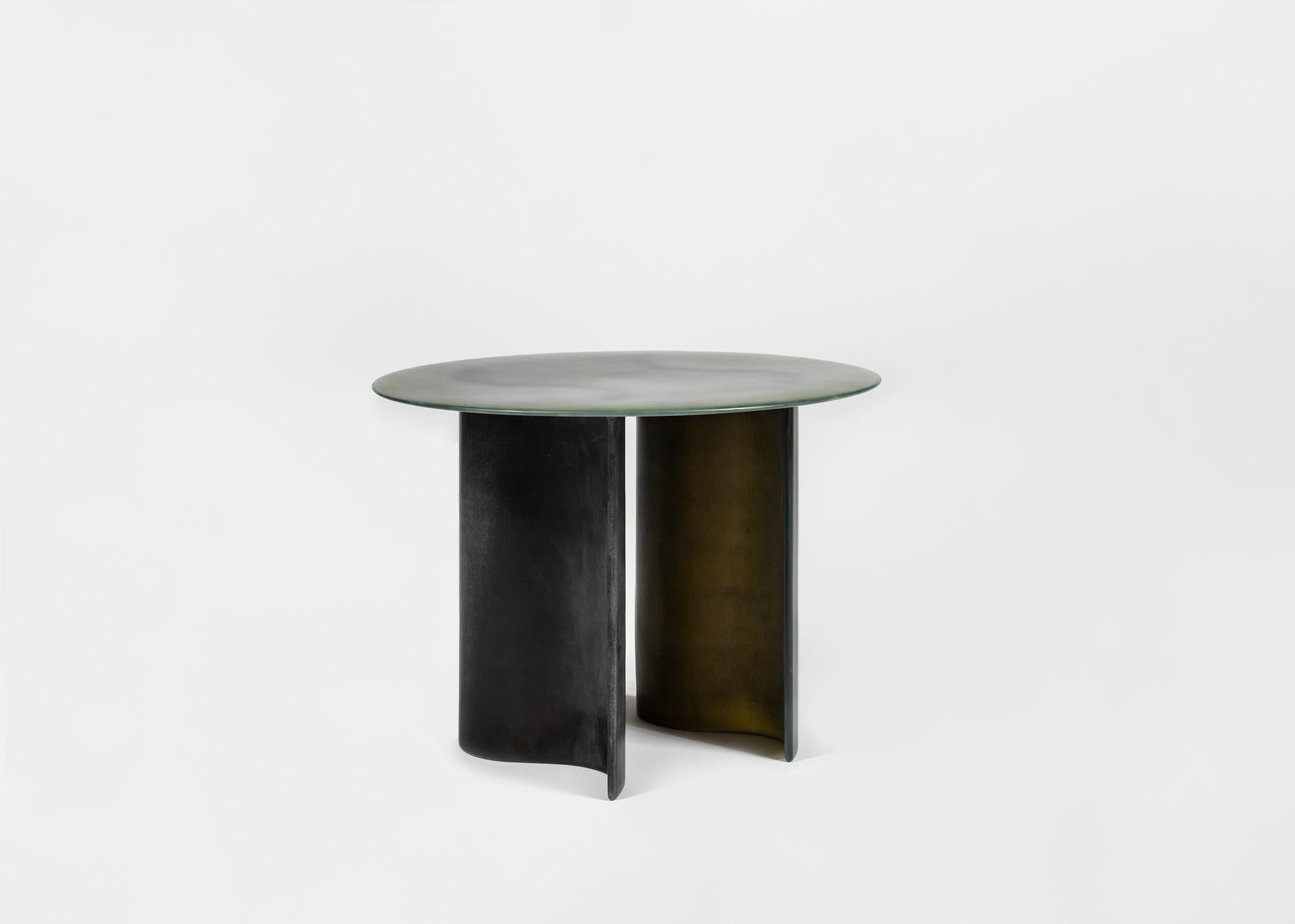 The New Wave Side Table by STUDIO LUKAS COBER. The New Wave collection illustrates his fascination for oceans force. They are built by hand-layering numerous layers of fiberglass cloth with resin into desired shapes. After combining the shapes and