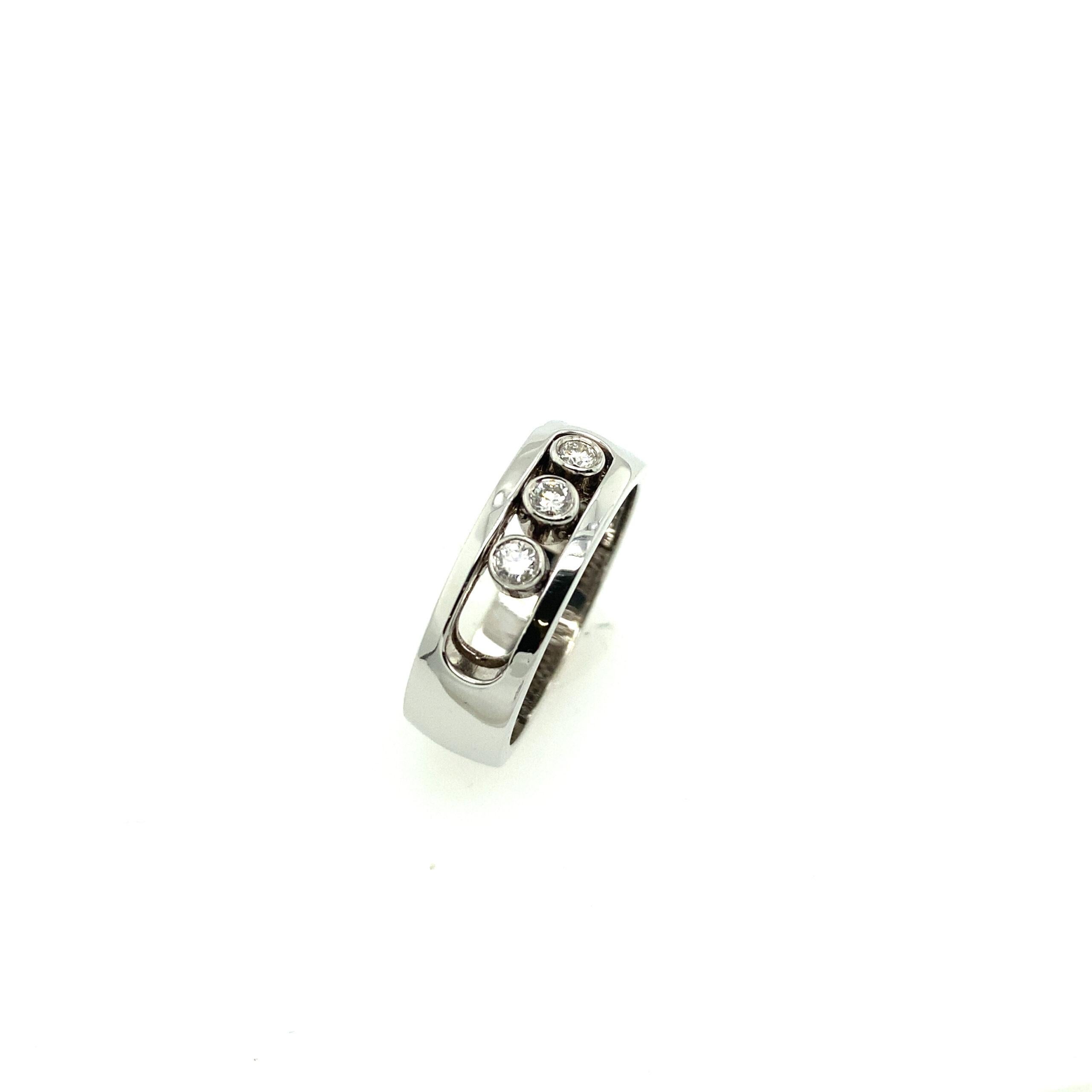 New 14ct White Gold 6mm Wide Band With 3 Sliding Diamonds

Additional Information:
Total Diamond Weight: 0.15ct
Diamond Colour: G/H
Diamond Clarity: SI
Ring Width: 6mm
Total Weight: 4.6g
Finger Size: L 1/2
SMS2104
