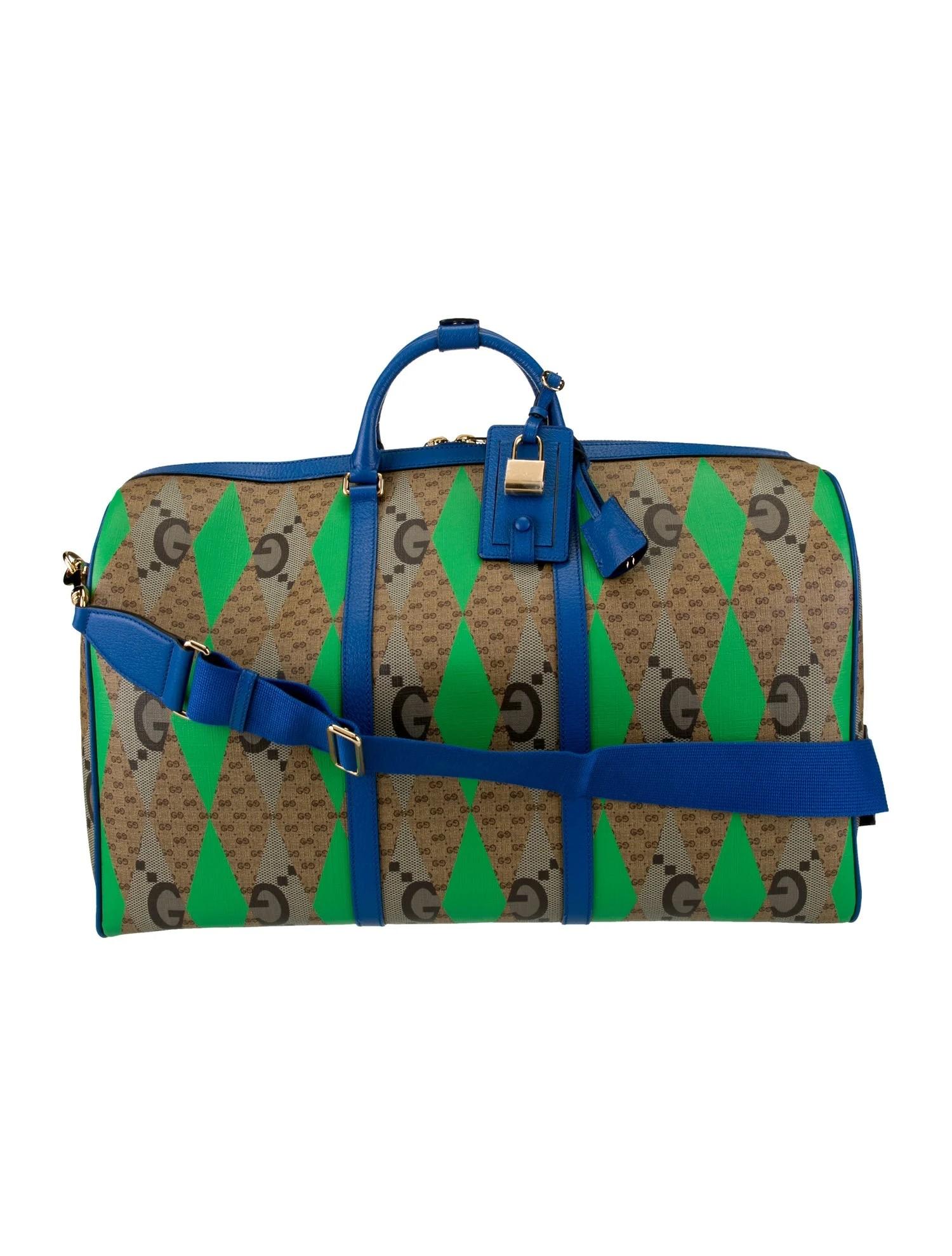 Brand New with Tags
$4650

GUCCI Canvas Calfskin Rhombus Collection Duffle
Gucci Weekender Bag Coated Canvas 
Gold-Tone Hardware 
Rolled Handles & Single Adjustable Shoulder Strap 
Canvas Lining & Dual Interior Pockets 
Zip Closure at Top