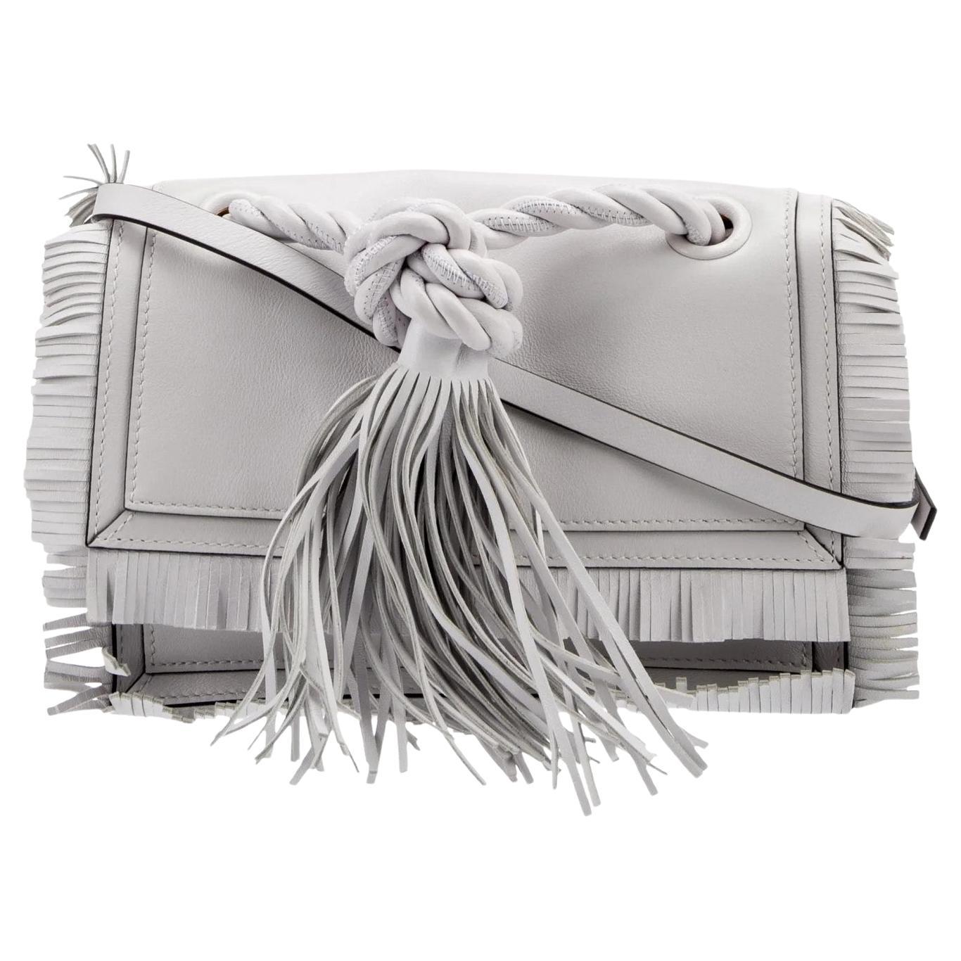 Valentino
Brand New With Tags
$2595

Valentino Crossbody Bag
White Leather
Gold-Tone Hardware
Braided Handle & Single Shoulder Strap
Fringe Trim Accent
Suede Lining & Single Interior Pocket
Snap Closure at Front

Shoulder Strap Drop: 21