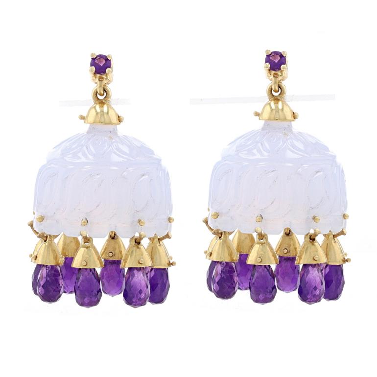 Metal Content: 18k Yellow Gold

Stone Information

Natural Chalcedony
Cut: Carved
Color: Light Purple

Natural Amethysts
Carat(s): 11.20ctw
Cut: Round & Briolette
Color: Purple

Total Carats: 11.20ctw

Style: Bell Chandelier
Fastening Type: