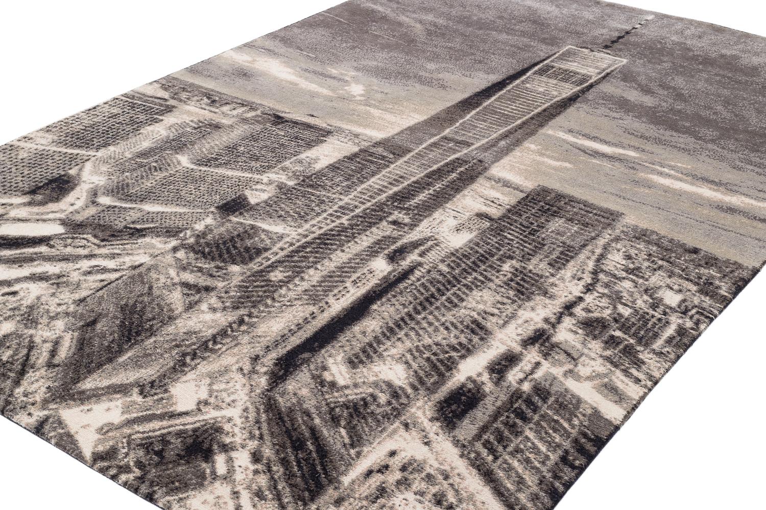 One World est une Collaboration entre la photographie d'Allan Tannenbaum et l'expertise de Joseph Carini Carpets en matière de tapis. Le résultat est un tapis ou une tenture murale d'une grande beauté. Les détails de ce tapis de laine et de soie