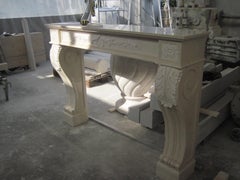 New York Fireplace in Botticino and Crema Marfil Marble