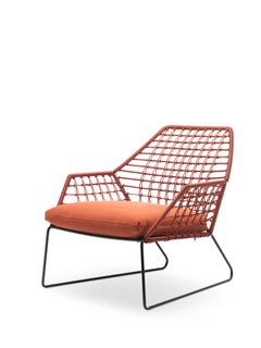 Poltrona New York Soleil con struttura in corda arancione e gambe nere di Sergio Bicego