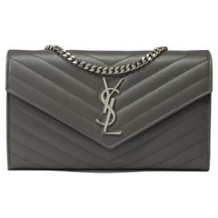 Used New YSL Pochette Cassandre classic shoulder bag in Grey leather, SHW