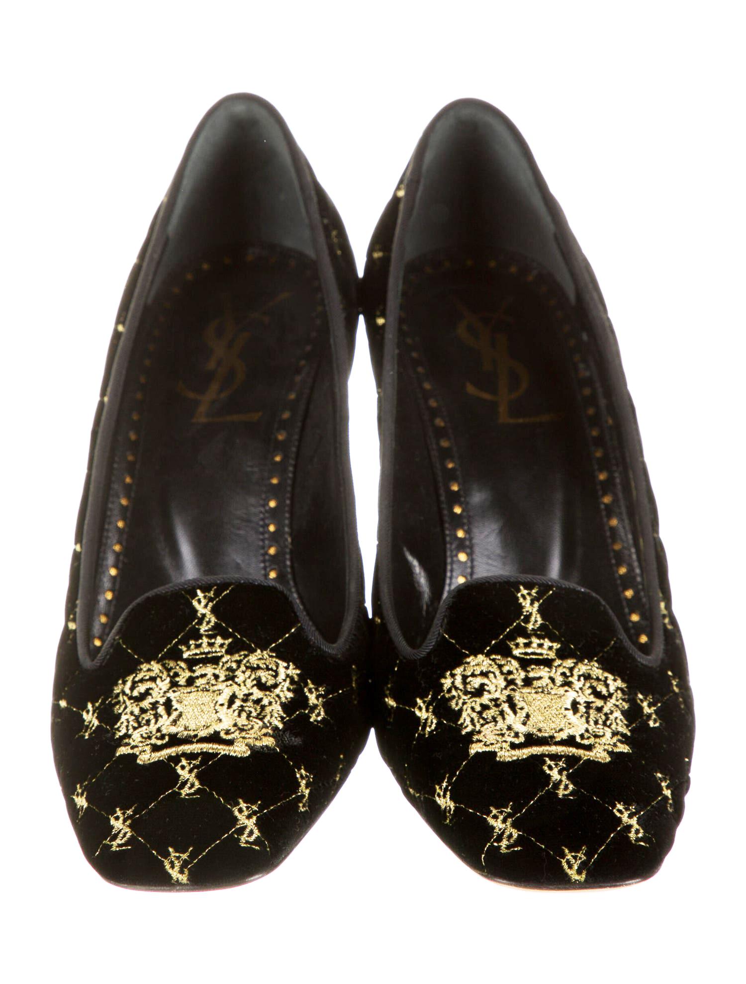 New and Rare Yves Saint Laurent Black Velvet Monogram Pumps Shoes
Designer size 39.5 - US 9.5
Midnight Black Velvet, Gold Metallic Embroidery of YVES  Monogram with the Quilted Look, Embroidery of Family Coat of Arms.
Branded Leather Insole, Leather