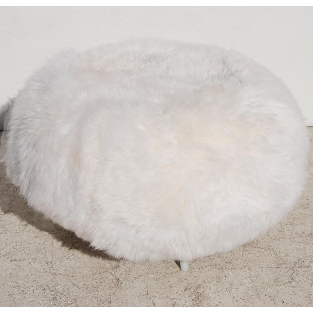 Ottoman restored in New Zealand Sheepskin by Allermuir

Recently reupholstered in soft sheepskin on a brushed aluminum base. 
Marked with manufacturer.

 