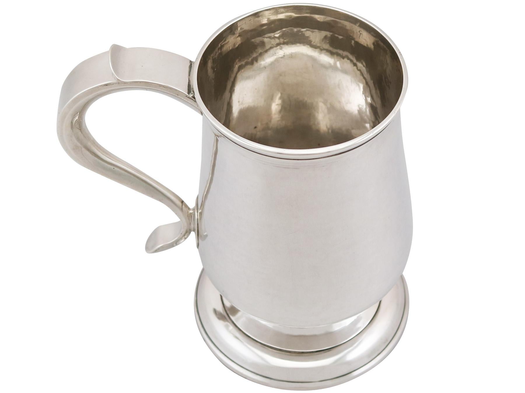 A fine and impressive antique Georgian Newcastle sterling silver pint mug made by John Robertson I & David Darling; an addition to our range of collectable silverware.

This fine antique George III Newcastle sterling silver mug has a plain