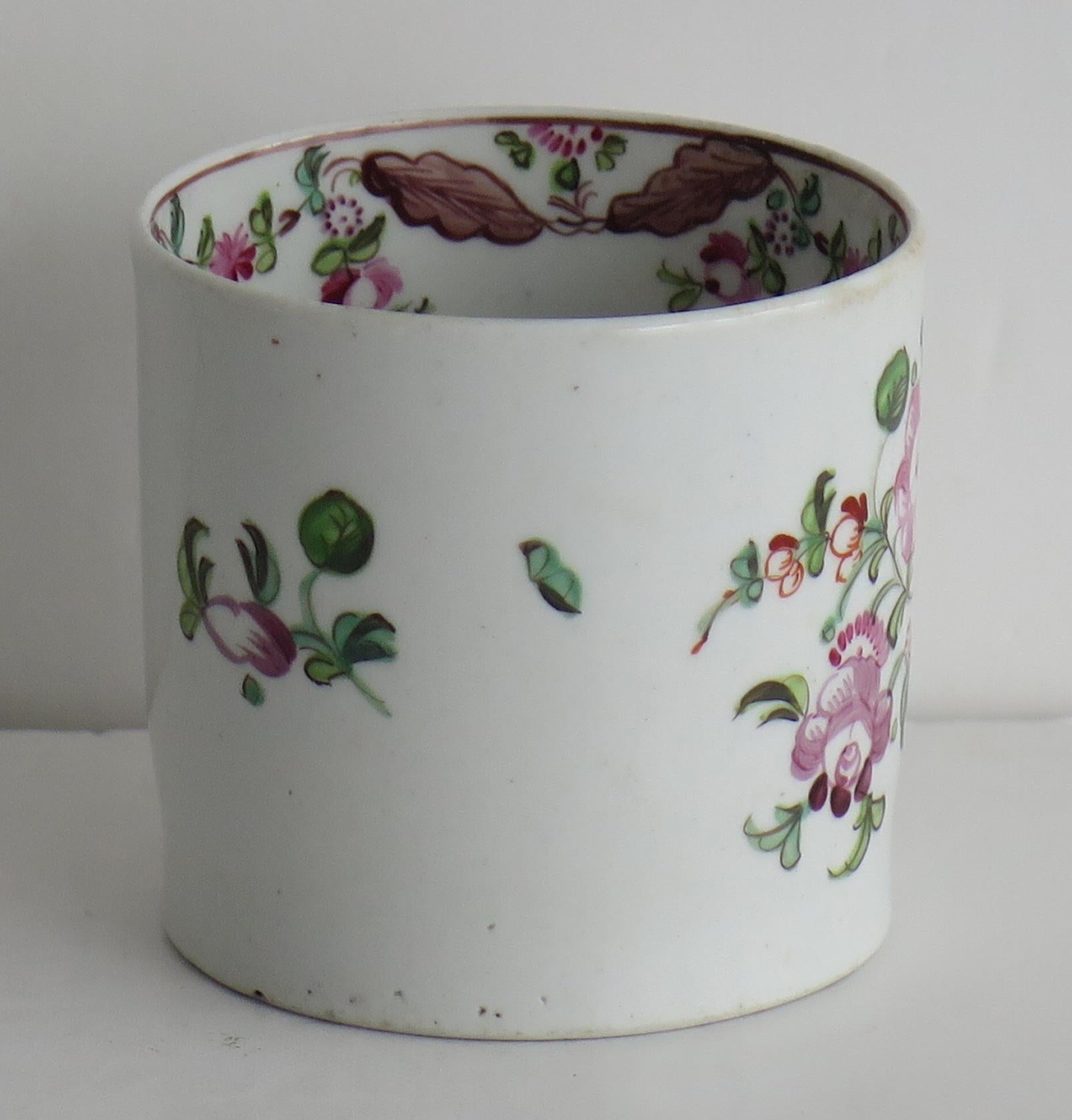 This is a hard paste porcelain coffee Can by New Hall, dating to the turn of the 18th century, George 111rd period, circa 1800.

The piece is well potted of hard paste porcelain on a low foot with a loop handle having rounded attachments.

The