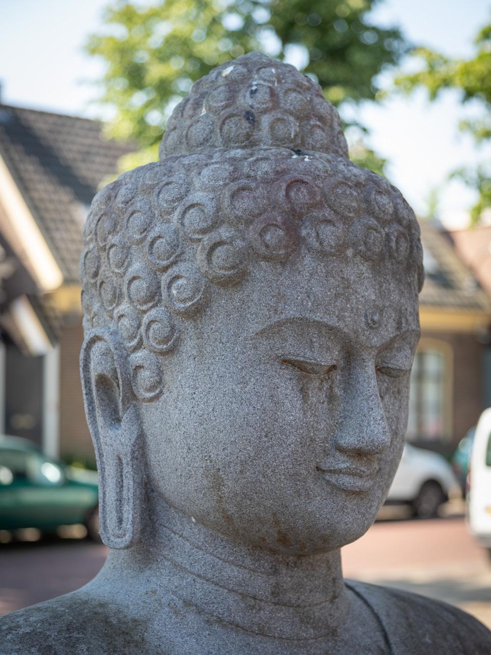 Newly made large lavastone Buddha statue from Indonesia in Varada Mudra In Good Condition For Sale In DEVENTER, NL