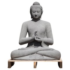statue de Bouddha en pierre de lave nouvellement fabriquée en Dharmachakra mudra