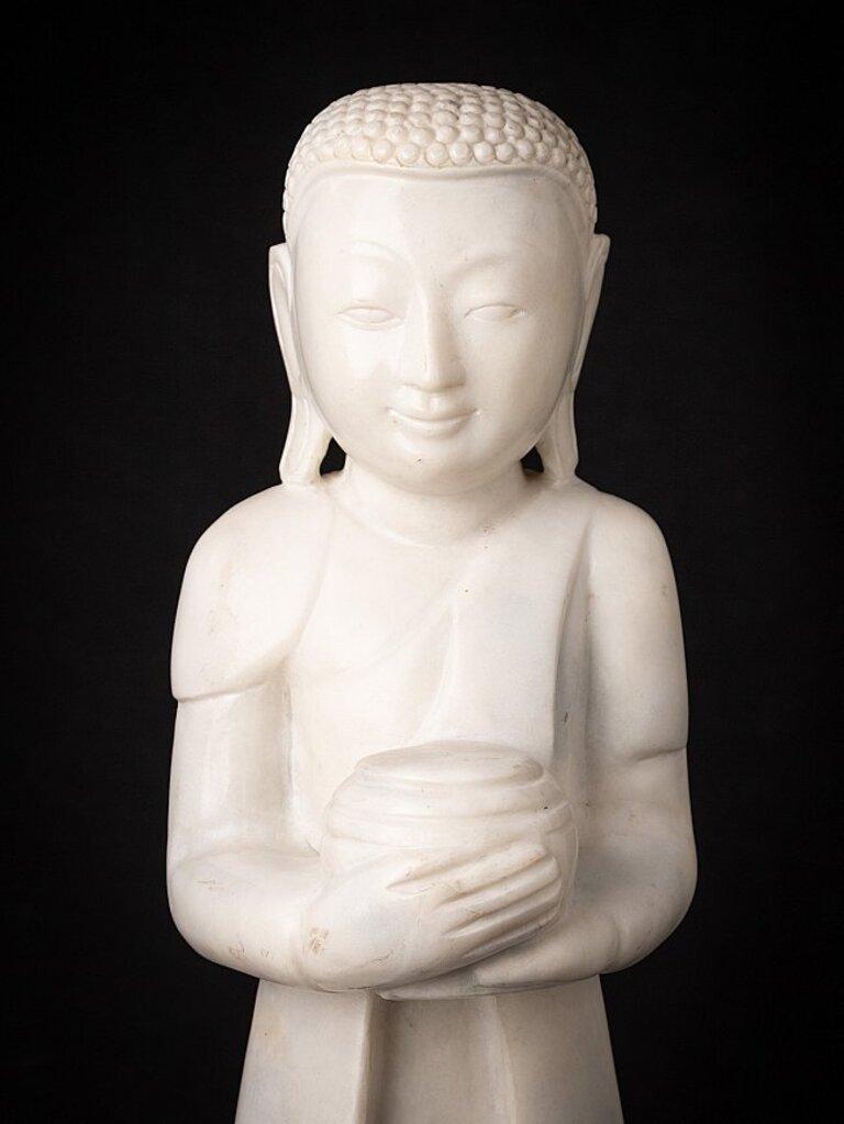 Material: marble
63 cm high 
16 cm wide and 17 cm deep
Weight: 17.95 kgs
Originating from Burma
Newly made
Hand carved from a single block of white marble.
 