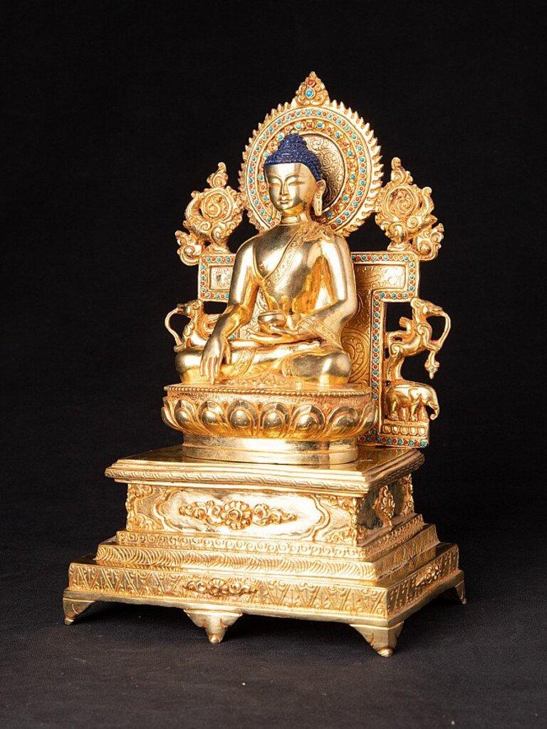 Material: bronze
25,9 cm high 
16,3 cm wide and 10,6 cm deep
Weight: 2.144 kgs
Fire gilded with 24 krt. gold
Bhumisparsha mudra
Originating from Nepal
Newly made in the highest quality !
 