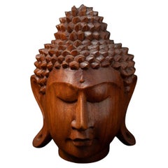 Newly made teakwooden Buddha head from Indonesia