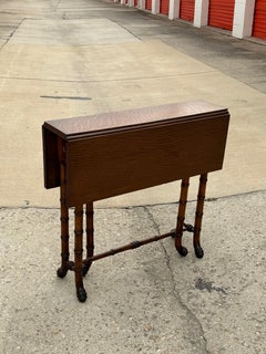 Newly Refinished Antique Drop-leaf Tiger Oak table with Faux Bamboo Legs