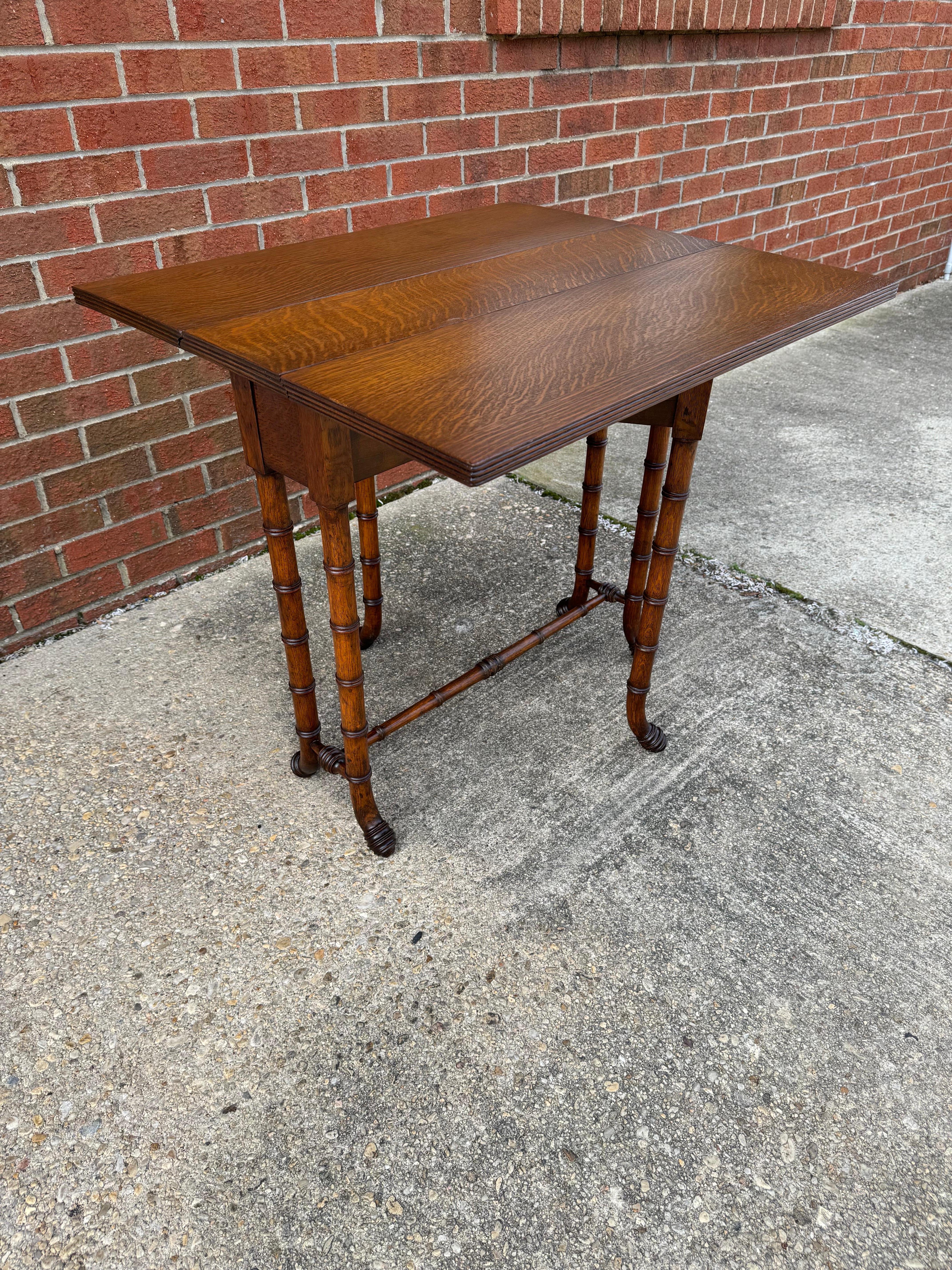Unknown Newly Refinished Antique Drop-leaf Tiger Oak table with Faux Bamboo Legs For Sale