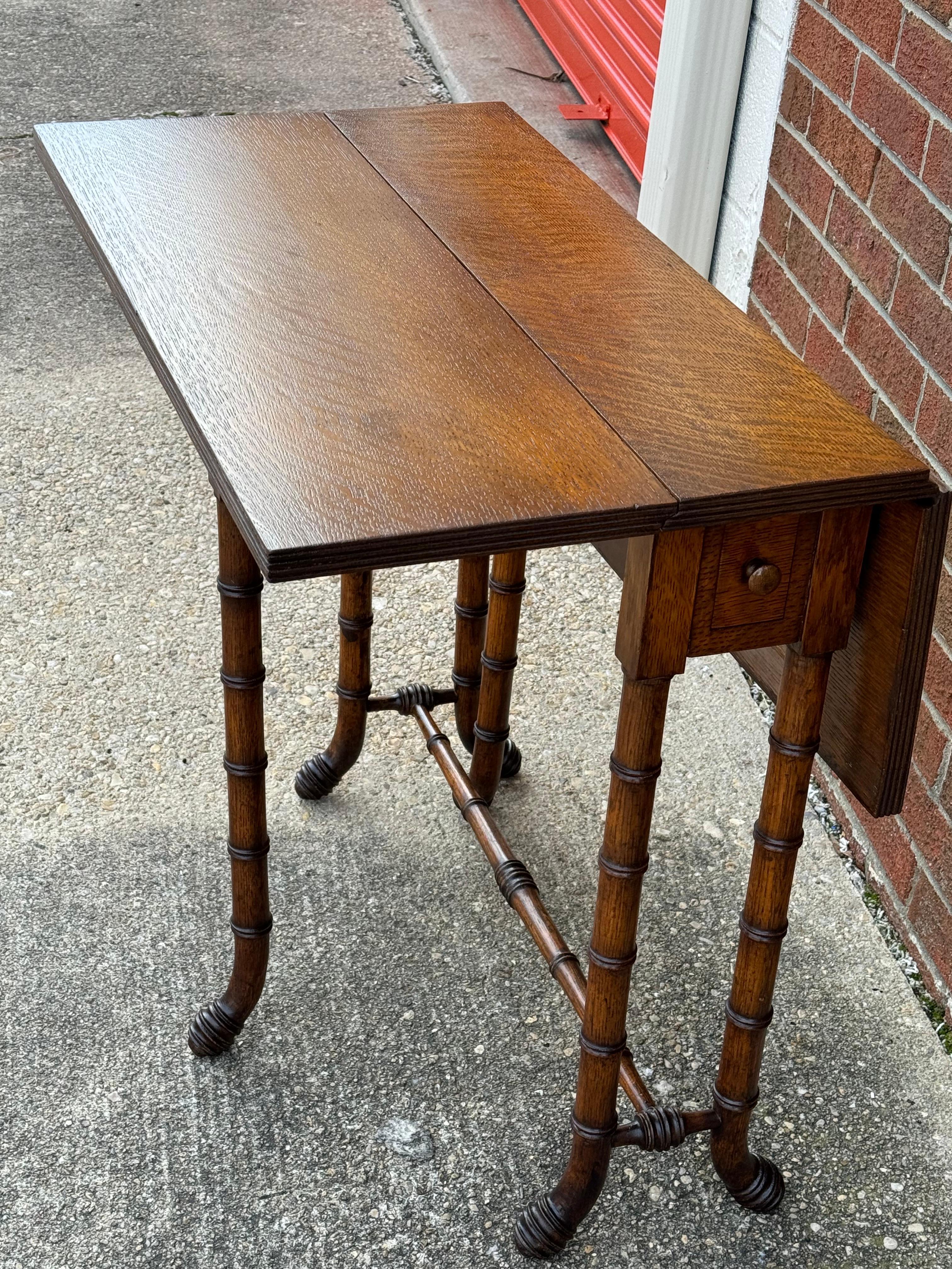 Hand-Crafted Newly Refinished Antique Drop-leaf Tiger Oak table with Faux Bamboo Legs For Sale