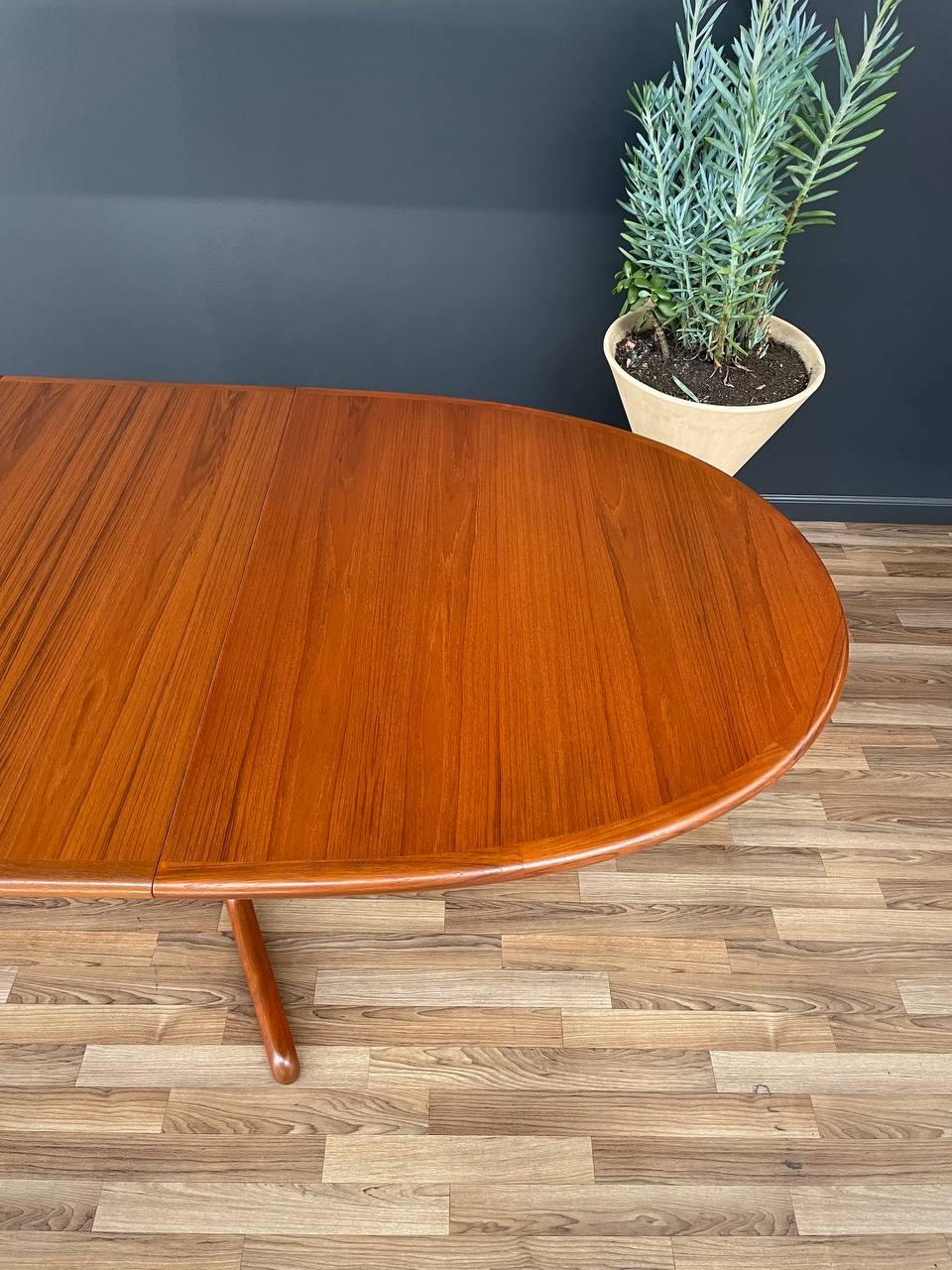 Mid-20th Century Newly Refinished - Expanding Mid-Century Danish Pedestal Teak Dining Table