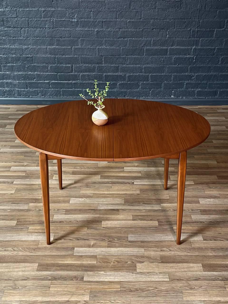 Newly Refinished-Expanding Mid-Century Modern Sculpted Floating Top Dining Table For Sale 1