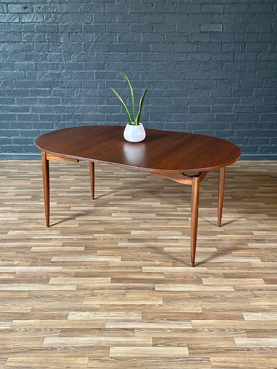American Newly Refinished - Expanding Mid-Century Modern Walnut Floating Top Dining Table