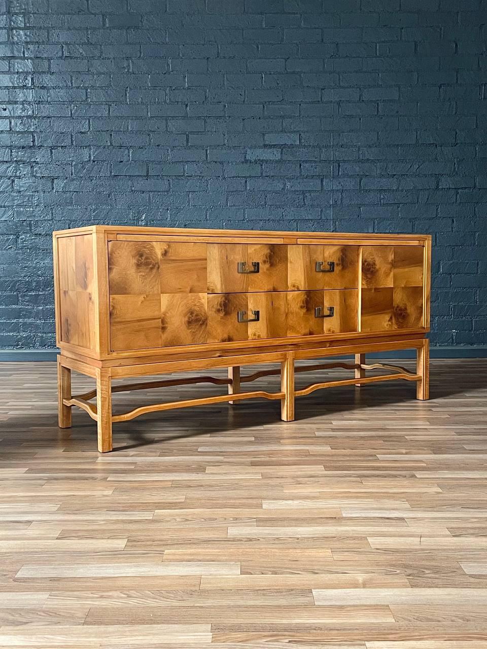 Condition: Expertly Refinished

Designer: Ray See 
Manufacturer: SeeMar of California 
Materials: Olive Burl Wood, Original Brass Pulls

With over 15 years of experience, our workshop has followed a careful process of restoration, showcasing our