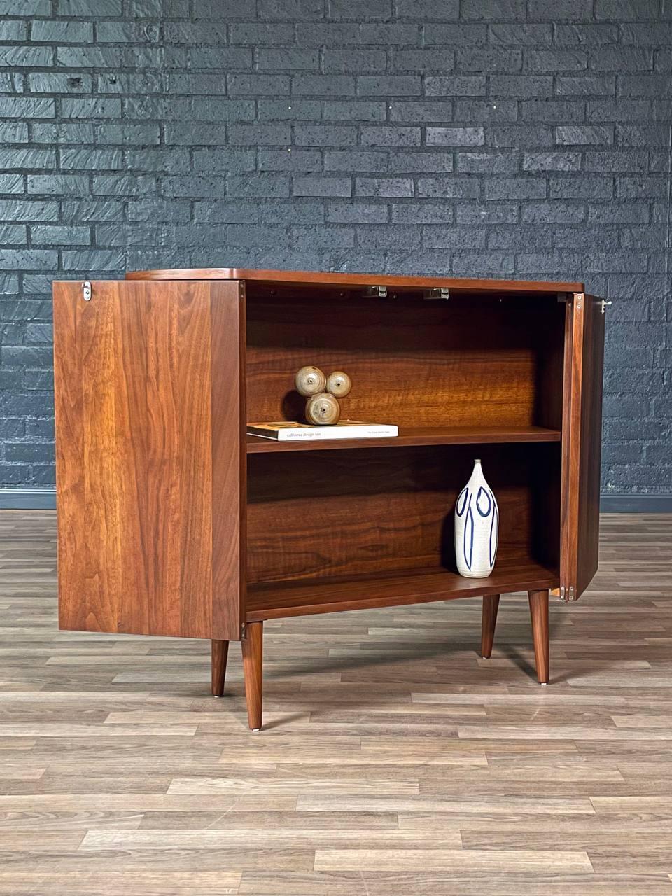 American Newly Refinished - Mid-Century Modern Sculpted Walnut Bow-Front Cabinet For Sale