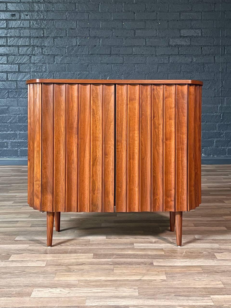 Mid-20th Century Newly Refinished - Mid-Century Modern Sculpted Walnut Bow-Front Cabinet For Sale