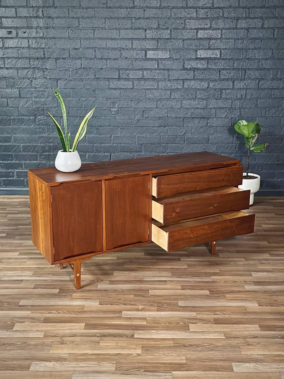 American Newly Refinished - Mid-Century Modern Sculpted Walnut Credenza by Stanley For Sale
