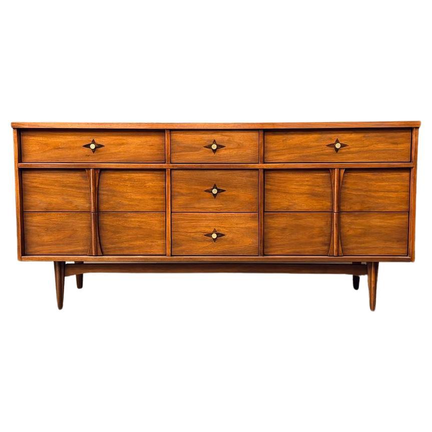 Newly Refinished  - Mid-Century Modern Sculpted Walnut Dresser  For Sale