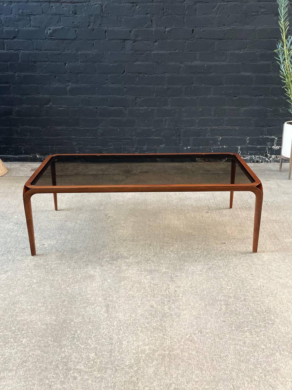 Newly Refinished - Mid-Century Modern Sculpted Walnut & Smoke Glass Coffee Table In Excellent Condition In Los Angeles, CA