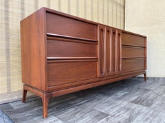 Newly Refinished Mid Century Modern Sculptural 9 Drawers Dresser. Circa 1960s.