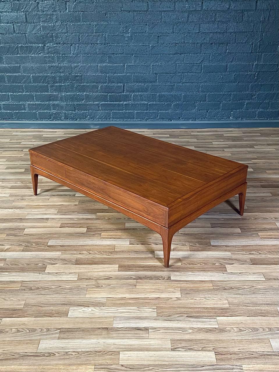 Condition: Expertly Refinished

This exquisite Mid-Century Modern Walnut Coffee Table by Lane from the 1960s is a timeless example of American craftsmanship. Constructed from rich, solid walnut, it showcases a sleek, low-profile silhouette with