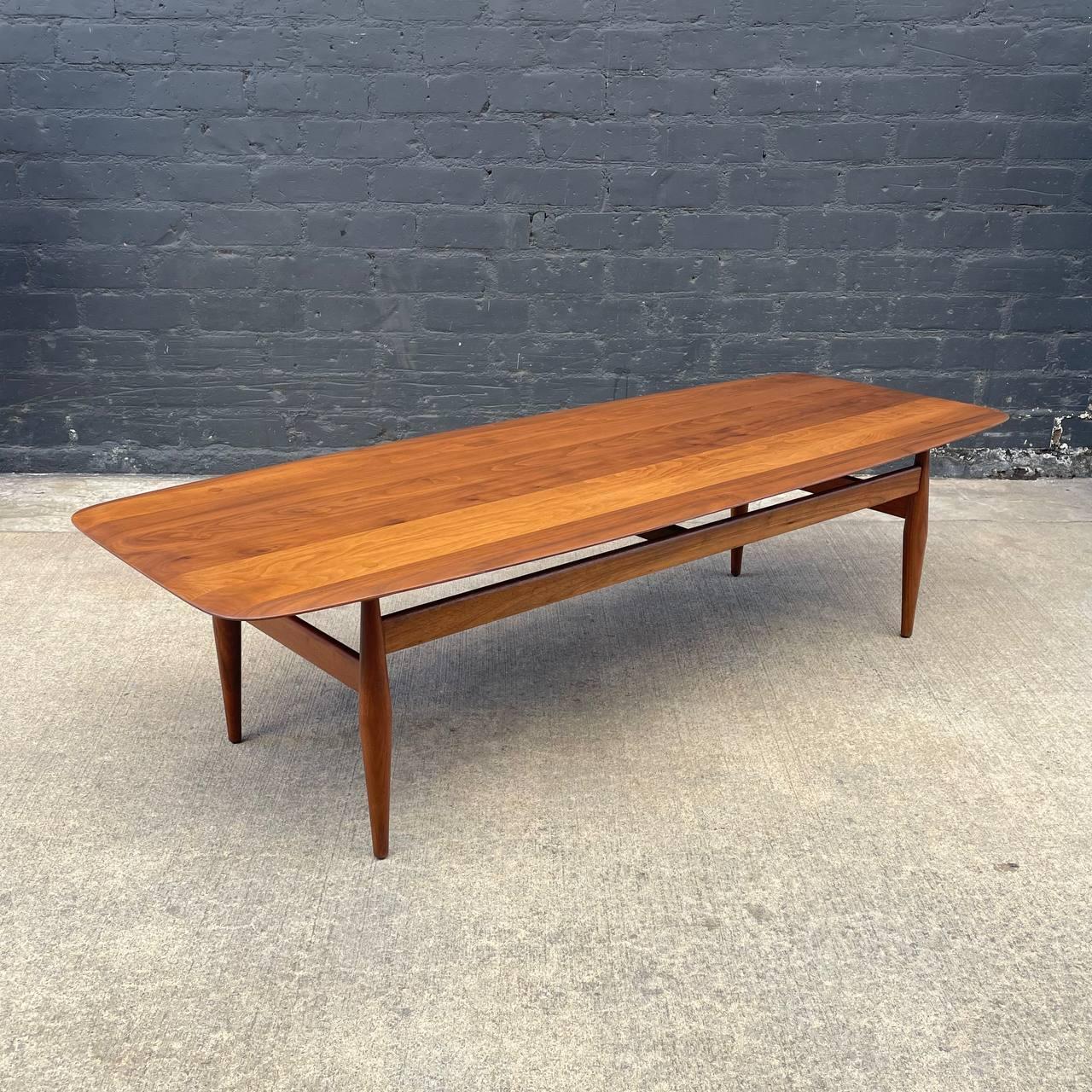 Newly Refinished Mid-Century Modern Walnut Coffee Table John Keal, Brown Saltman

Year: c.1950’s

With over 15 years of experience, our workshop has followed a careful process of restoration, showcasing our passion and creativity for vintage designs