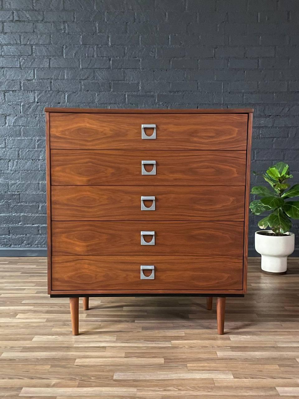 Condition: Expertly Refinished 

Materials: Walnut, Metal Pulls

With over 15 years of experience, our workshop has followed a careful process of restoration, showcasing our passion and creativity for vintage designs that can seamlessly be
