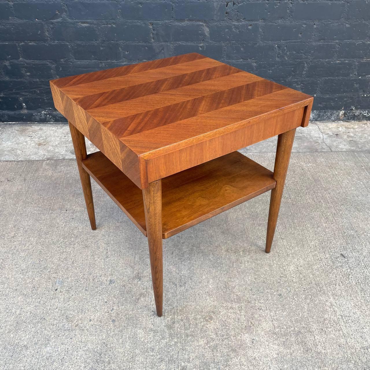 Newly Refinished - Mid-Century Modern Walnut Two-Tier Side Table by Lane

With over 15 years of experience, our workshop has followed a careful process of restoration, showcasing our passion and creativity for vintage designs that can seamlessly be