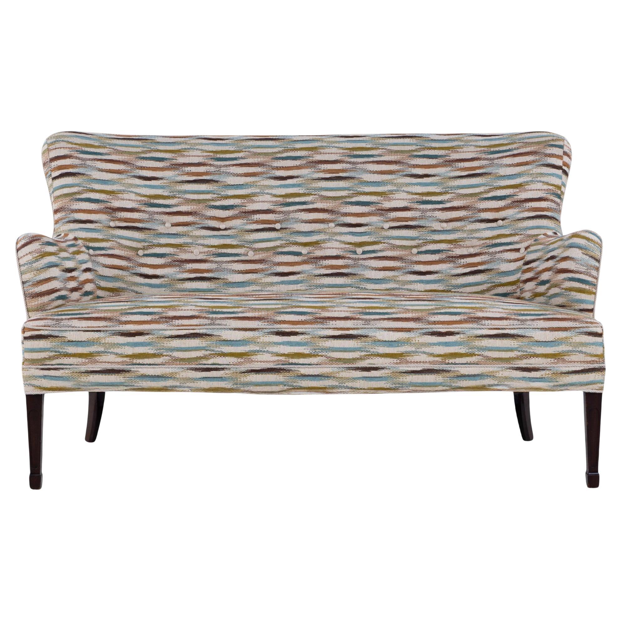 Newly upholstered 2-seater sofa in textile by Frits Henningsen For Sale