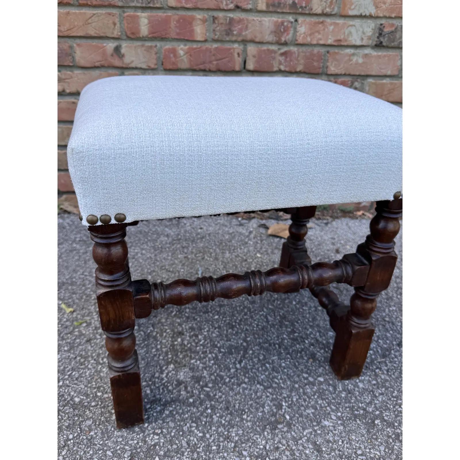 Lovely English Jacobean stool with new fabric and padding. The antique frame is 19th century and fabric is vintage white linen with nailhead trimming. Great accompaniment to any chair or space.

Dimensions
16ʺW × 11ʺD × 17ʺH