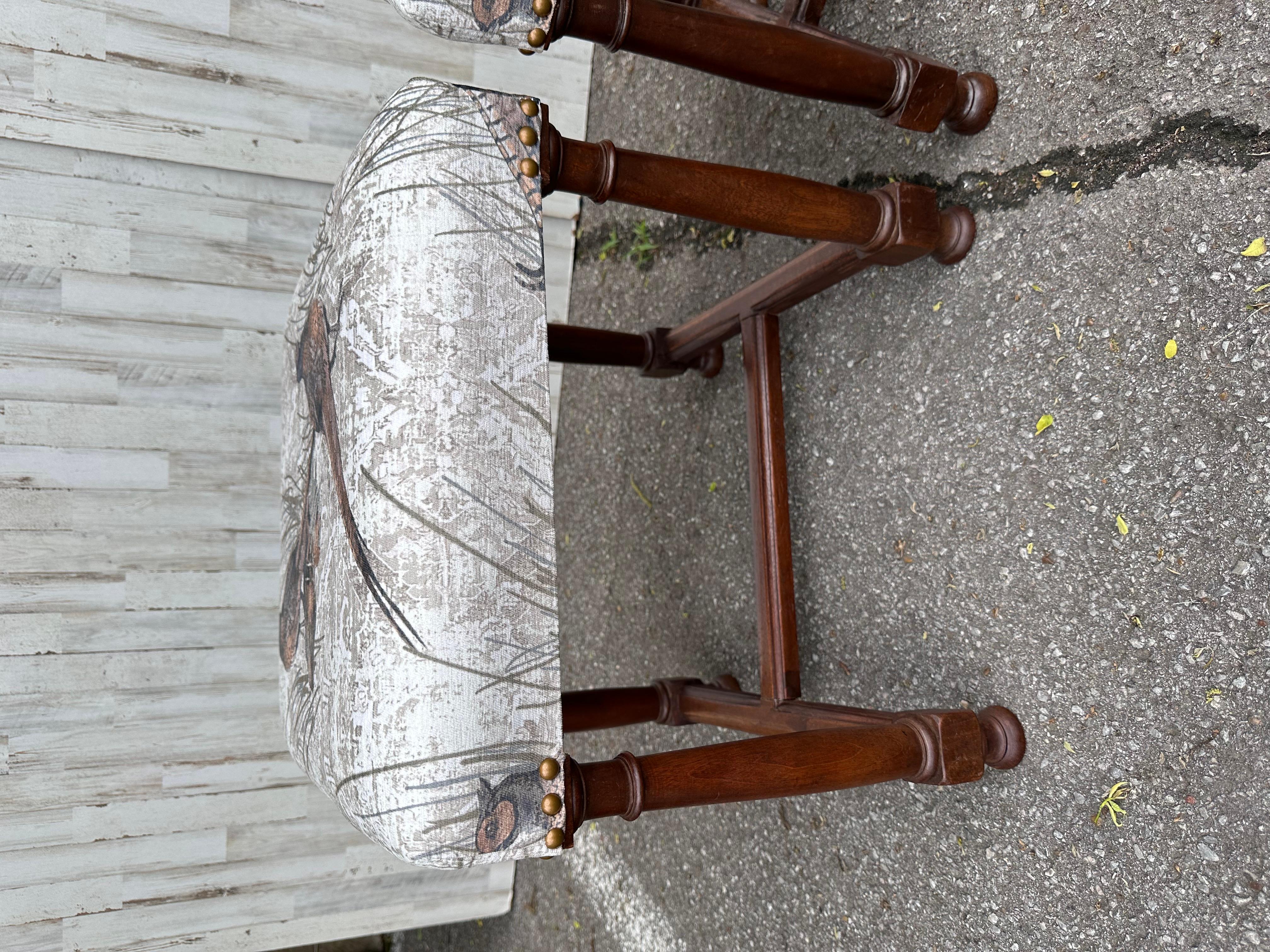 These 19th century English frames have been made especially unique with new fabric! The stools are in excellent condition with lovely patina. The new fabric is a neutral gray tone background with 2 beautifully colored pheasants as the focal point.