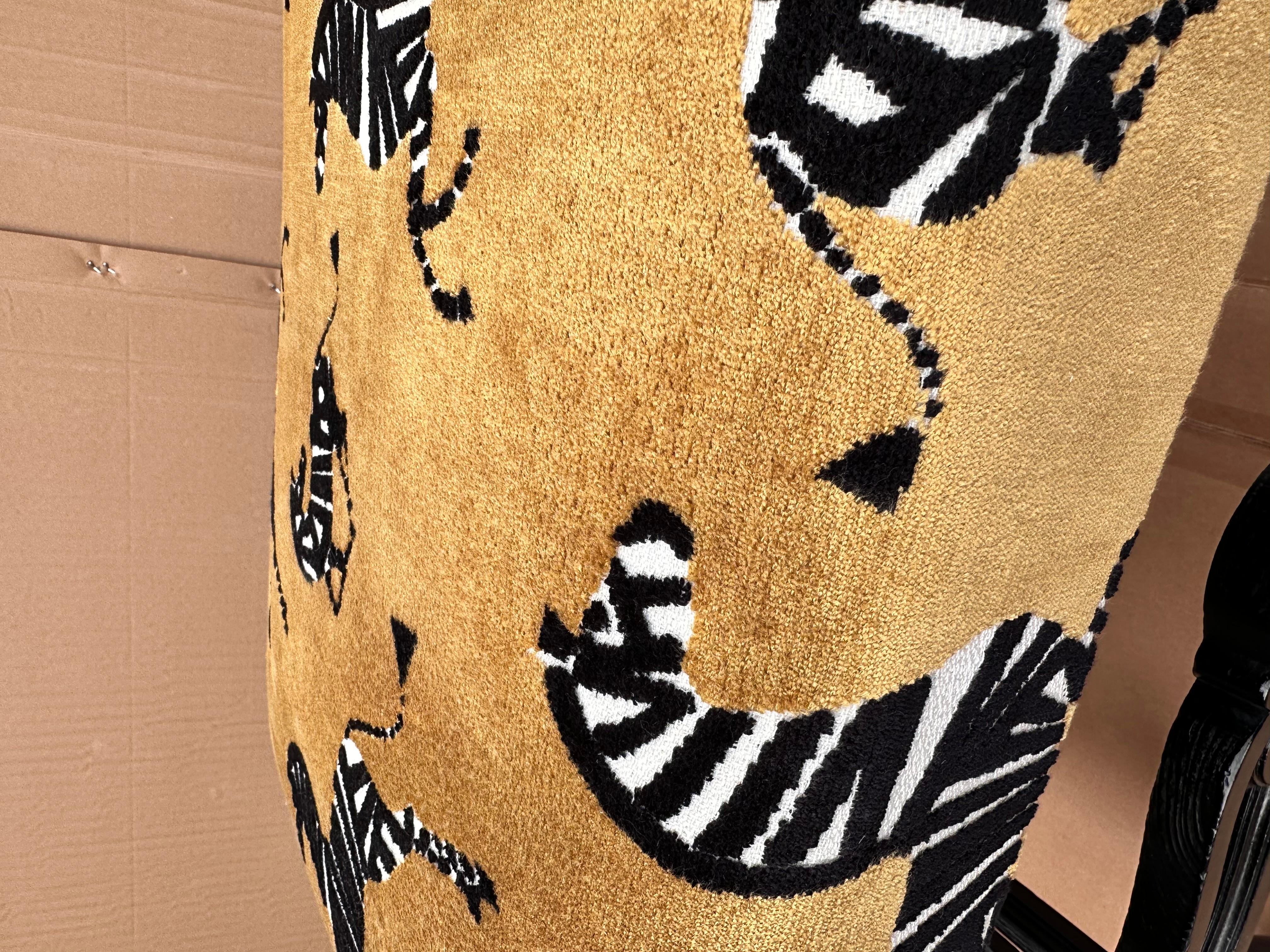 This bench is the perfect way to add dynamic touch to your space! The antique frames have been newly reupholstered in a quirky, attractive zebra patterned cut velvet fabric. yellow and black paired with the black frames make a lovely aesthetic and