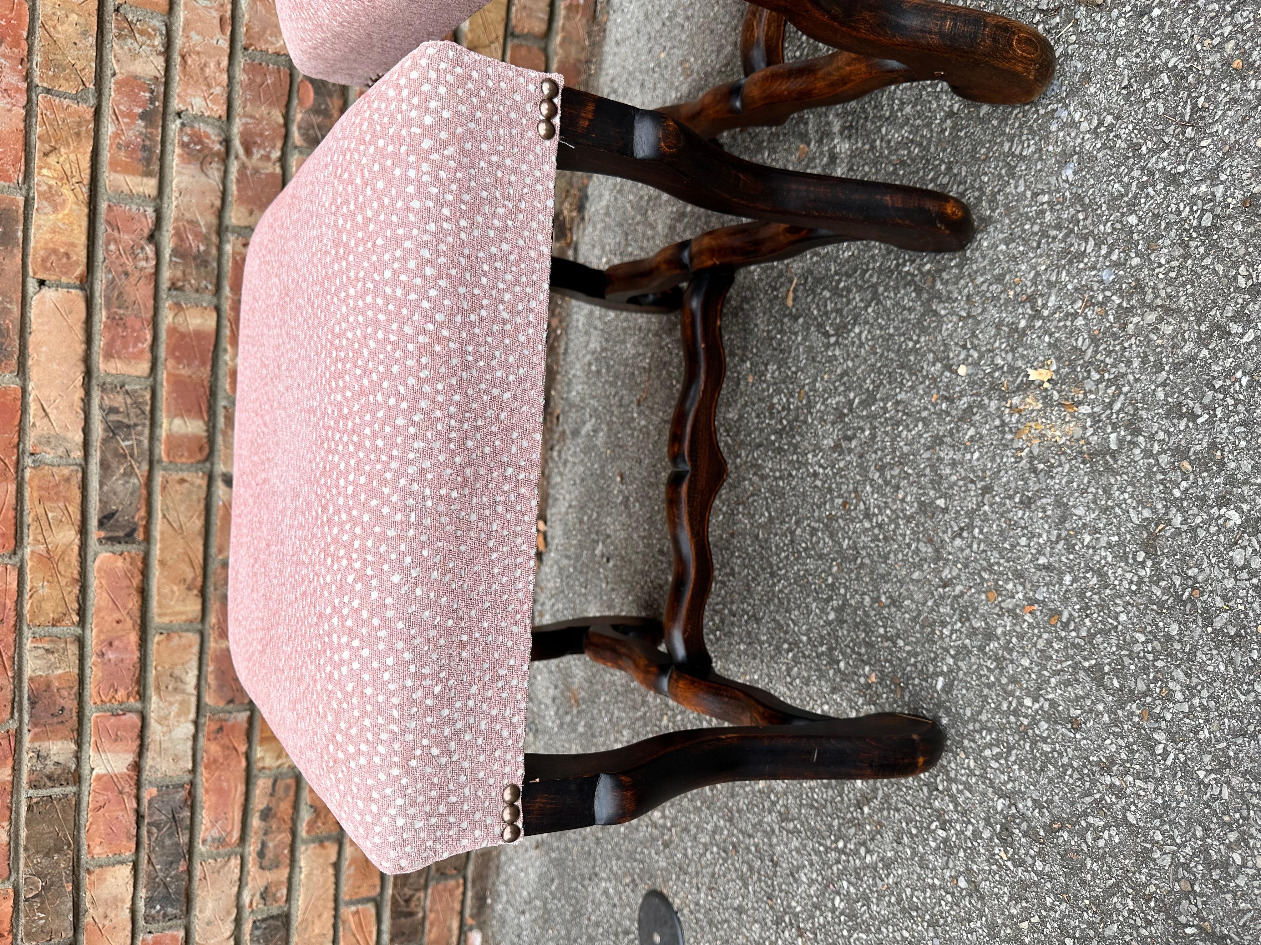 This is such a beautiful set of stools! The frame is an original French antique, with beautiful curves and design. It has been newly upholstered in a fabric that complements it well. The fabric is a soft pint polkadot design that can add color