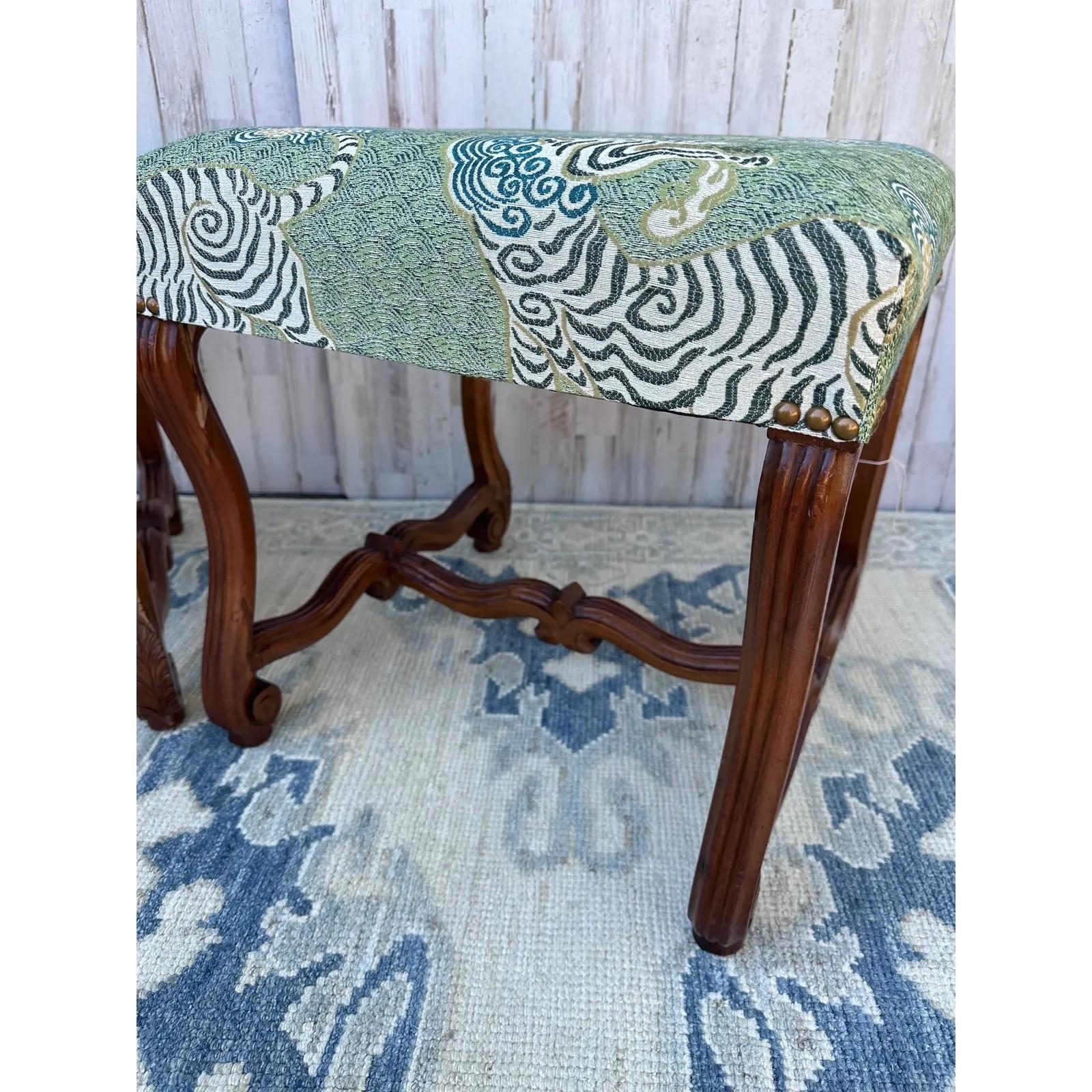 What an amazing pair of antique French stools. We had them upholstered, in this green and cream foodog Fabric and we all know how popular foo dogs are. These will make for such a cheerful and happy look in your space. l
