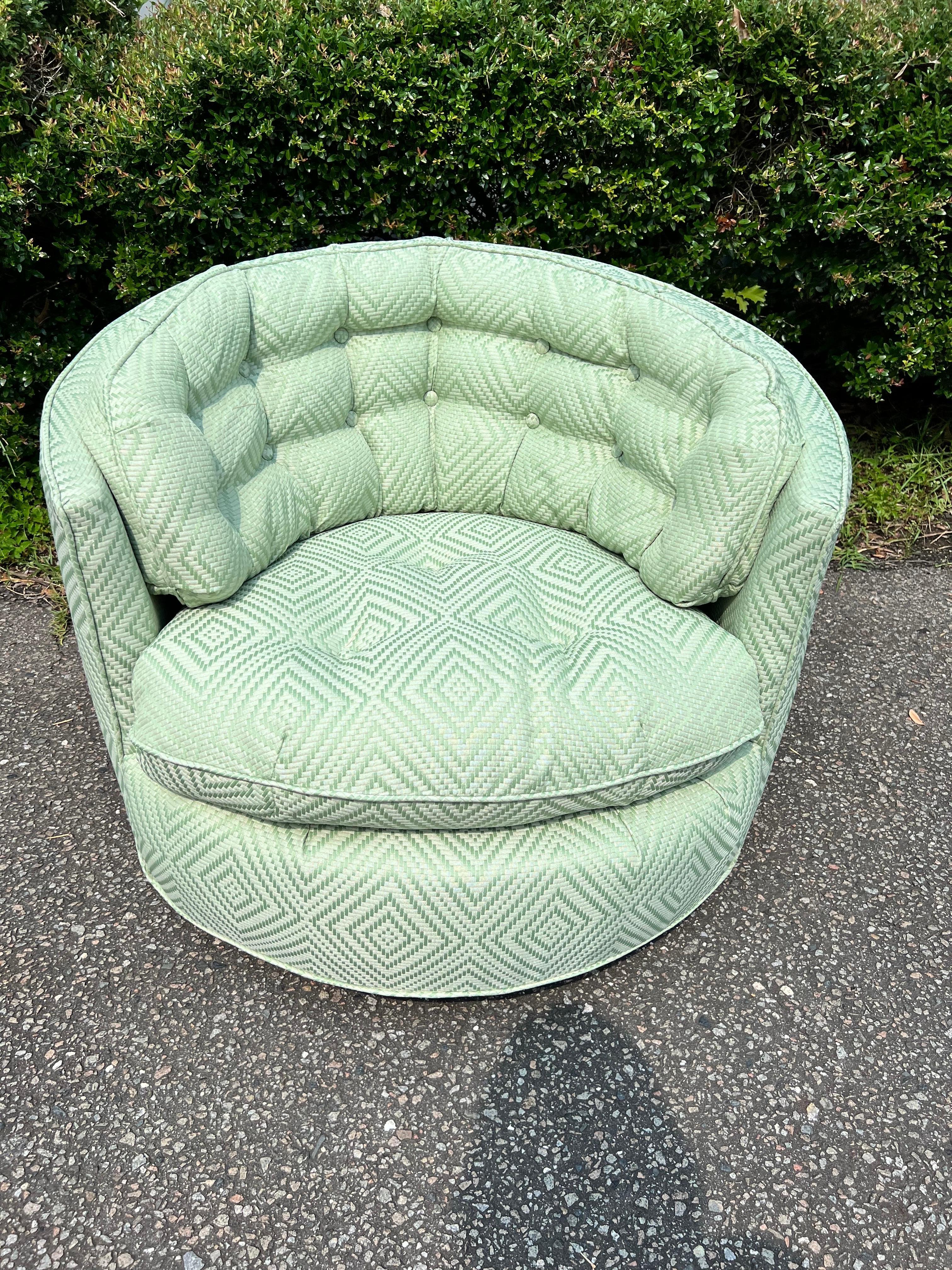 Fabulous upholstered chair by Milo Baughman for Thayer-Coggin.   Newly upholstered in a green diamond weave upholstery fabric. tufted button detail swivel chair on walnut base.  This chair has been refinished from top to bottom.   And it is so dang