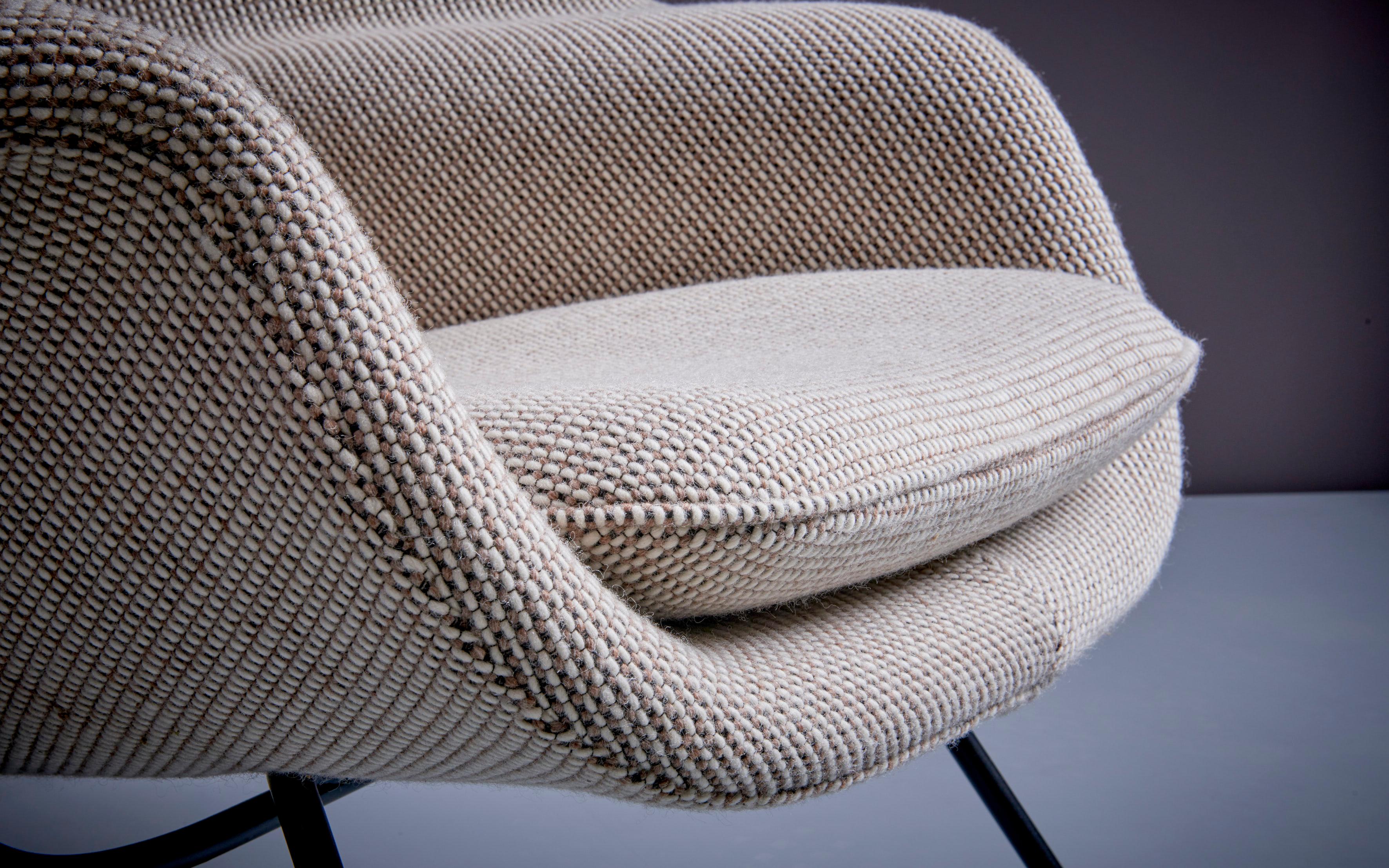 The measurements given apply to the lounge chair. The ottoman measures 52 cm in depth, 70cm in width and 36cm in height. Reupholstered in Cato Fabric by Knoll Textiles. 

The Knoll Womb Chair is a modern Classic of furniture design, created by